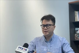 Enzo Sim Hong Jun, a Malaysian researcher specialising in Southeast Asian history and defence, grants an interview to the Vietnam News Agency. (Photo: VNA)