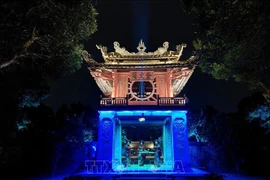 Khue Van Cac (Pavilion of Constellation of Literature) at the Temple of Literature in Hanoi attracts tourists with its lighting effects and traditional art performances. (Photo: VNA)