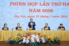 Prime Minister Pham Minh Chinh (centre) speaks at the meeting (Photo: VNA)