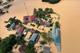 A heavily-flooded residential area in Yen Binh commune, Lang Son province (Photo: VNA)