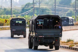 Multinational victims of scam centres, who were tricked or trafficked into working in Myanmar, travel on army trucks after they were sent to Thailand, in Phop Phra district, Tak province, February 12, 2025. (Photo: Reuters)