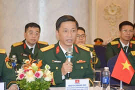 Senior Lieutenant Colonel Nguyen Quang Huy, head of the Youth Department under the VPA's General Department of Politics, speaks at the exchange. (Photo: qdnd.vn)