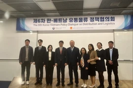 Delegates at the policy dialogue (Photo: VNA)