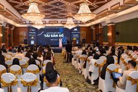 Participants at a conference on digital assets in Hanoi on December 10. (Photo: VNA)