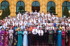 State President Luong Cuong and delegates (Photo: VNA)