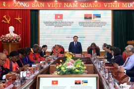 Nguyen Xuan Thang, Politburo member and President of Ho Chi Minh National Academy of Politics, speaks at the programme's opening ceremony (Photo: VNA)