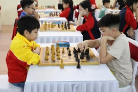 Players take part in a match after the opening ceremony (Photo: VNA)