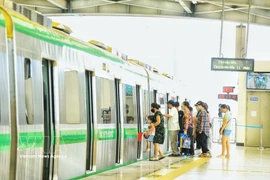 Passengers travel on urban railway Line 2A Cat Linh-Ha Dong. (Photo: VNA)