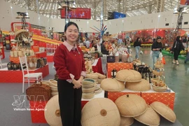 A booth showcasing bamboo and rattan handicrafts from Ninh So craft village in Hong Van commune (Hanoi) at the Spring Fair 2026. (Photo: VNA)