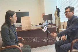 Xiaohong Li, Director of the UN Office on Drugs and Crime (UNODC) New York Liaison Office (L) speaks to Vietnam News Agency correspondent in New York. (Photo: VNA)