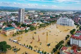 Downtown Thai Nguyen province submerged in floodwater (Photo: VNA)