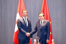 NA Chairman Tran Thanh Man (R) meets with President of the Swiss Council of States Andrea Caroni in Geneva on July 29. (Photo: VNA)