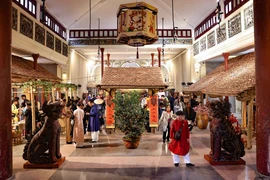For the first time, the relic site at 22 Hang Buom street has been transformed into a living tableau of the Red River Delta’s authentic Tet atmosphere (Photo: VNA)