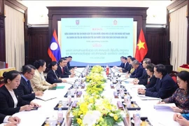 The talks between Chief Justice of the Supreme People’s Court of Vietnam Le Minh Tri and his Lao counterpart Viengthong Siphandon in Hanoi on October 28, 2025. (Photo: VNA)