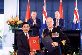 General Secretary of the Communist Party of Vietnam Central Committee and President To Lam and New Zealand Prime Minister Christopher Luxon witness the signing of cooperation agreements between the two countries on August 13, 2026. (Photo: VNA)