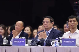 PM Pham Minh Chinh attends the plenary session of the Vietnam Private Economic Landscape Programme 2025 (ViPEL 2025) in Hanoi on October 10. (Photo: VNA)