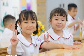 All public school students, from preschool to high school, will be exempt from tuition fees starting in the 2025–2026 academic year, starting this September. (Photo: VNA)