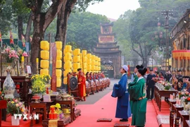 The recreation of Tien lich (calendar presentation ceremony), an important year-end ritual in which the royal court presented the new calendar for the coming year to the king, within a programme at the Thang Long Imperial Citadel in Hanoi on February 10. (Photo: VNA)
