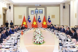The talks between Vietnamese Prime Minister Pham Minh Chinh and his Malaysian counterpart Anwar Ibrahim in Kuala Lumpur on May 25 (Photo: VNA)