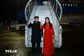 Prime Minister Pham Minh Chinh and his spouse (Photo: VNA)