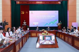 A symposium on the upgrade of the stock market status and the expansion of capital mobilisation channels for the economy on July 30 (Photo: VietnamPlus)