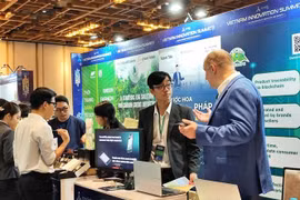 Products are promoted at the event. (Photo: VNA)