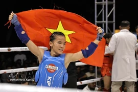 Phan Thi Hong Lien wins the last gold for of Vietnam to help the team place No 1 in the sixth World Kun Khmer Championships' tally. (Photo: VNA)