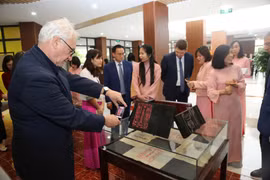 International experts admire Vietnam’s documentary heritage at the exhibition space. (Photo: VietnamPlus)