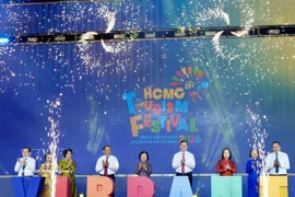 Officials mark the opening of the 22nd Ho Chi Minh City Tourism Festival on April 2. (Photo: VNA)