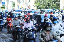 Emission inspections for motorcycles and motorised vehicles will begin in Hanoi and Ho Chi Minh City on July 1, 2027. (Photo: VNA)