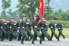 Female officers from multiple forces at the rehearsal. (Photo: VNA)