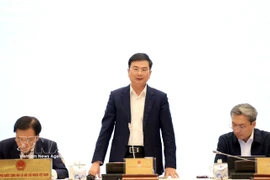 Deputy Governor of the State Bank of Vietnam Pham Thanh Ha answers reporters’ questions. (Photo: VNA)