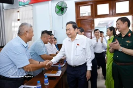 Chairman of the National Assembly Tran Thanh Man meets voters in Ba Diem commune, Ho Chi Minh City. (Photo: VNA)