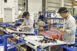 Experts said that Vietnam’s economic outlook continues to be underpinned by stable foreign direct investment inflows and public investment, which is playing an important role in driving growth. (Photo: thoibaotaichinh.vn)