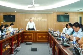 An overview of the meeting in Ho Chi Minh City to discuss measures to ease pressures on production and trade, and stablise the domestic market amid the escalating conflict in the Middle East. (Photo: VNA)