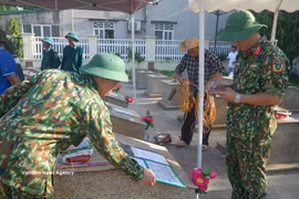Each properly collected sample and accurately recorded piece of information brings the search for the names of unidentified martyrs one step closer to completion, helping ease the historical pain that still weighs on many families and society as a whole. (Photo: VNA)