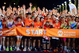 Runners at the race (Photo: VNA)
