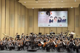 Asian Youth Orchestra artists perform at the concert on August 12. (Photo: VNA)