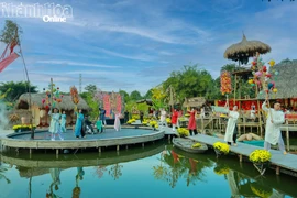 A performance using Tet symbols run as part of the ongoing traditional Tet programme at the old Nha Trang craft village in Khanh Hoa province (Photo: baokhanhhoa.vn)