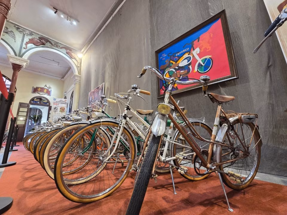 Although not directly related to traditional crafts, the vintage Peugeot bicycles and motorcycles reflect an important part of Hanoi's urban heritage, having once been symbols of elegance among the city's middle class and officials during the French colonial period. (Photo: VietnamPlus)