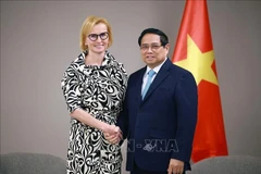 Prime Minister Pham Minh Chinh (R) and Chairwoman of the Communist Party of Bohemia and Moravia (KSCM) Katerina Konecna at their meeting in Prague on January 18. (Photo: VNA)