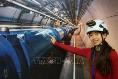 Physicist Pham Le Thu Ha, or Joni Pham, at the ATLAS system in the European Organisation for Nuclear Research (CERN). (Photo: VNA)