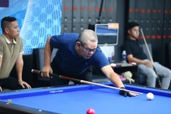 Veteran Ly The Vinh will participate in the three-Cushion Carom Billiards World Cup in HCM City next month. (Photo: thanhnien.vn)