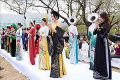 The 'ao dai' collection by designer Han Phuong at the fashion show (Photo: VNA)