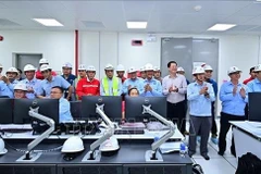 PV Power leaders and engineers officially operate the Nhon Trach 3 power plant as it connects to the national grid. (Photo: VNA)