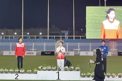 Mai Ngoc Anh (left) on the podium of the Asian U18 Athletics Championships' high jump event in Qatif, Saudi Arabia. (Photo: Vietnam Sports Team)