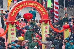 Young people embark on their national service duties on February 13 in Hanoi. (Photo: VNA) 