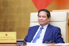 Prime Minister Pham Minh Chinh at the government meeting on decentralisation, delegation of authority in Hanoi on May 29. (Photo: VNA)