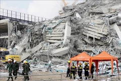 The scene of the collapsed building in Bangkok, Thailand, caused by the earthquake in Myanmar. (Photo: Kyodo/VNA)