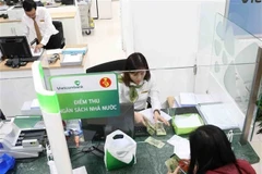 A state budget collection point at a Vietcombank office. (Illustrative photo: VNA)